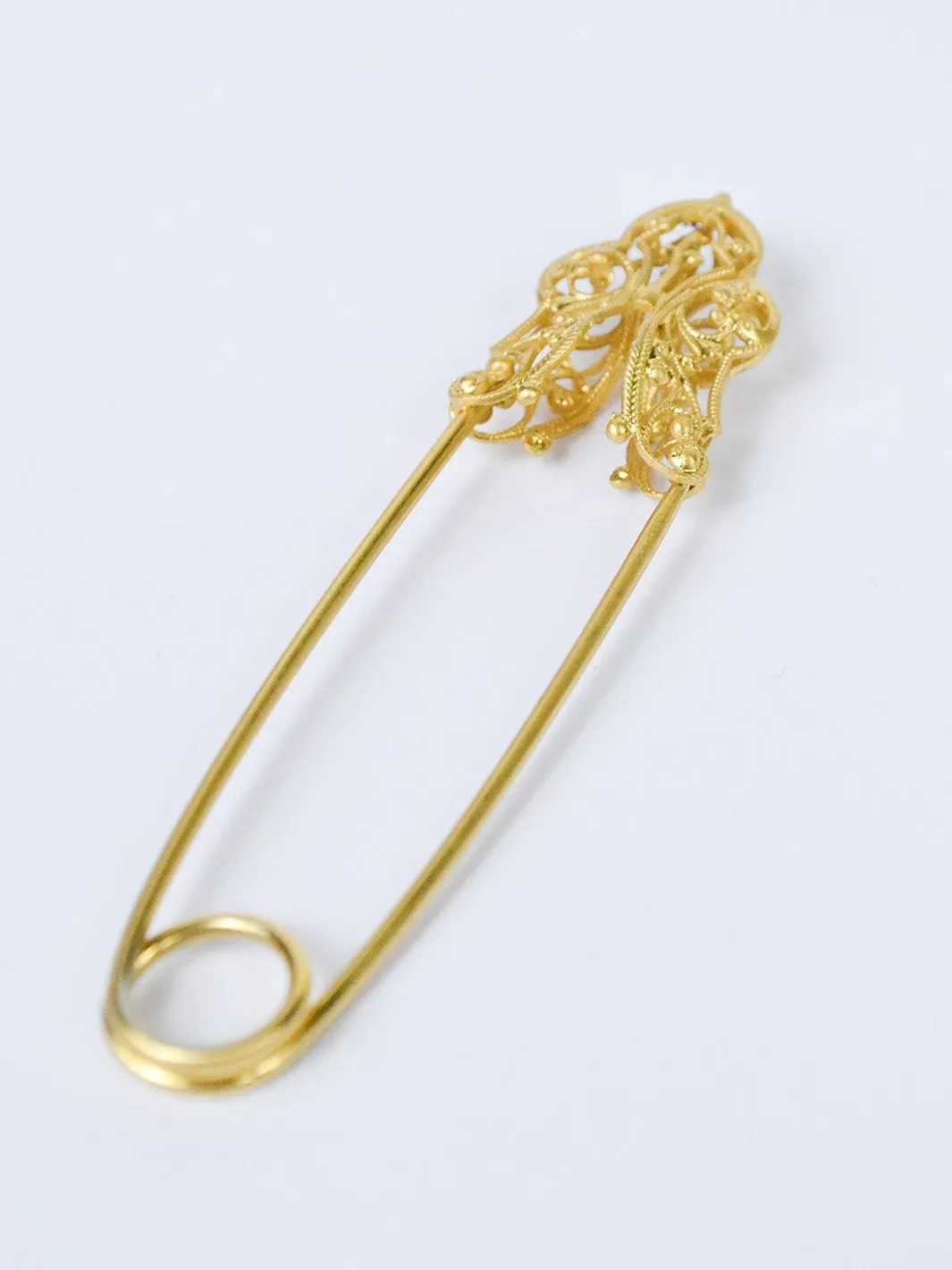 1970s safety pin golden brooch