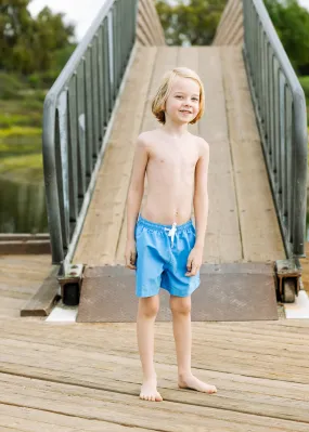 boys swim trunks in blue